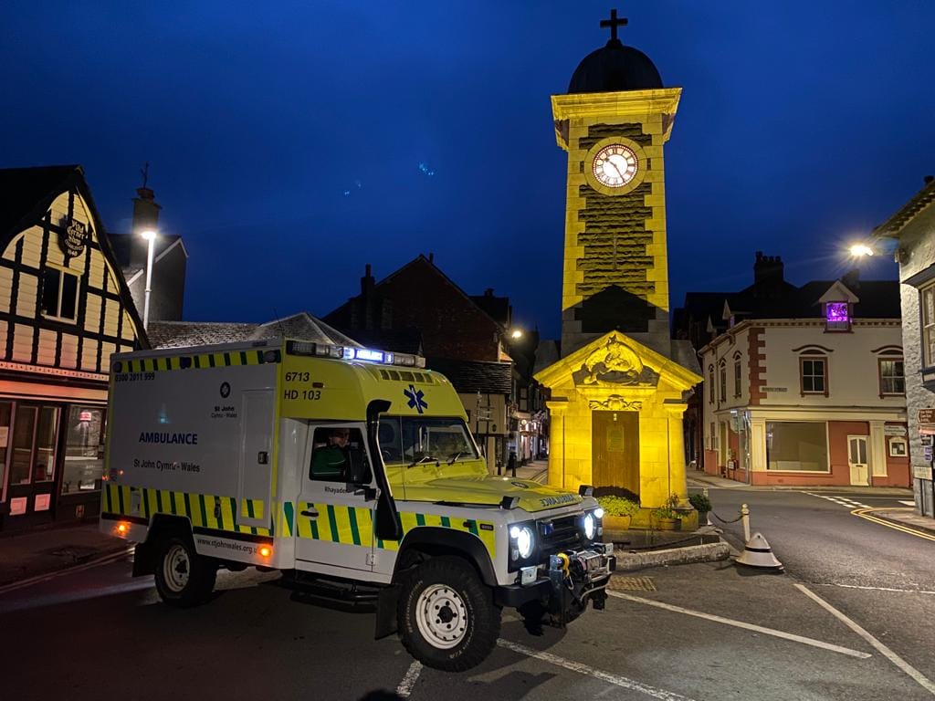 War Memorial Clock, Rhayader lit up for st john's day